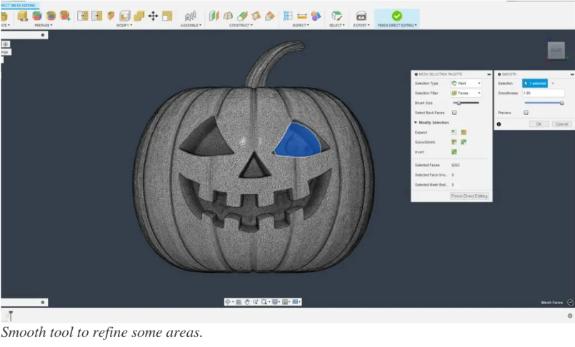 Blender mesh editing view of a Halloween pumpkin 3D model, using the Smooth tool to refine selected facial geometry for cleaner surfaces